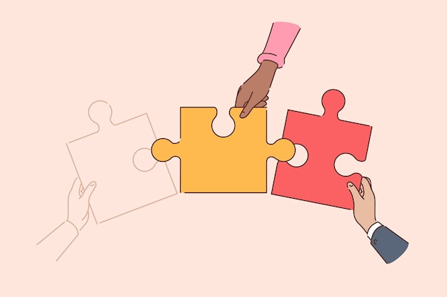 Travail d'équipe de gens d'affaires dont les mains assemblent un grand puzzle pour atteindre l'unité et la synergie