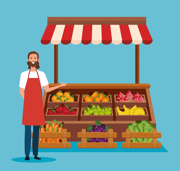 Vendeur Avec Tablier Et Fruits Et Légumes Sains
