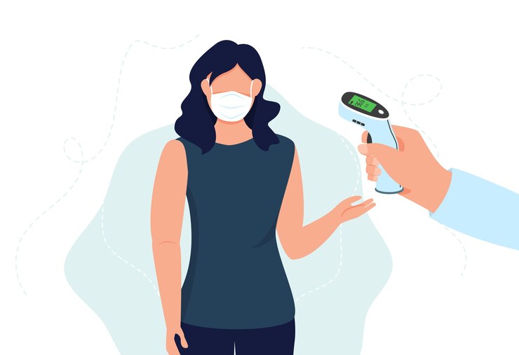 Vérifiez la température corporelle avant d'entrer dans la zone publique. Main tenant un thermomètre infrarouge pour mesurer la température corporelle. Femme vérifiant la température