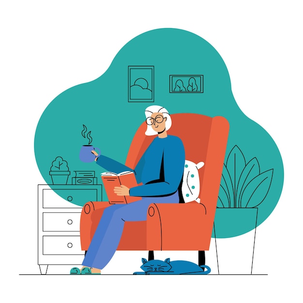 Une vieille femme assise sur un fauteuil tenant un livre en train de lire et de boire du thé chaud