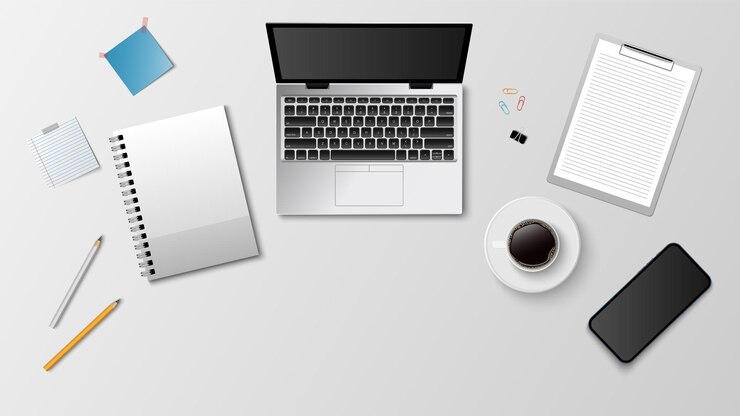 Vecteur vue supérieure de l'espace de travail coworking intérieur du bureau à domicile avec ordinateur portable et table et tasse à café documents smartphones et ordinateurs portables illustration vectorielle
