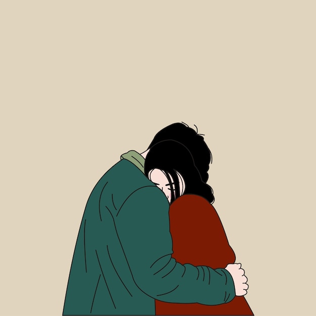 a couple embraces in front of a yellow background
