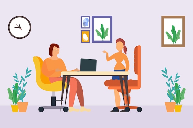 A man and woman are sitting at a desk in front of a cactus picture.