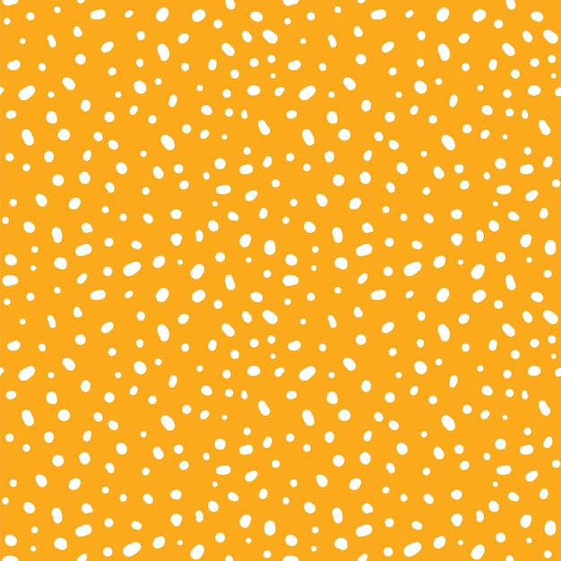 abstract seamless hand drawn pattern with white dots on a yellow background