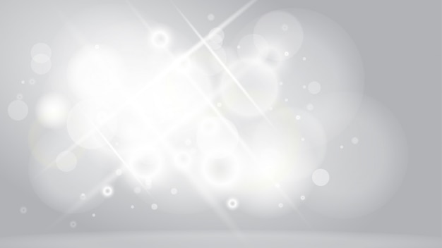 Abstract White background with bokeh lights effect.