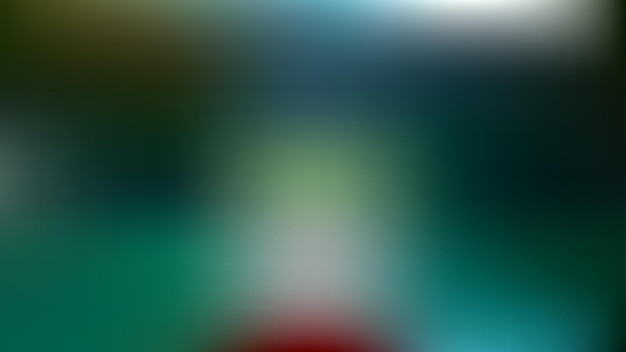 An abstract background featuring a blurred gradient in vibrant colors providing a colorful