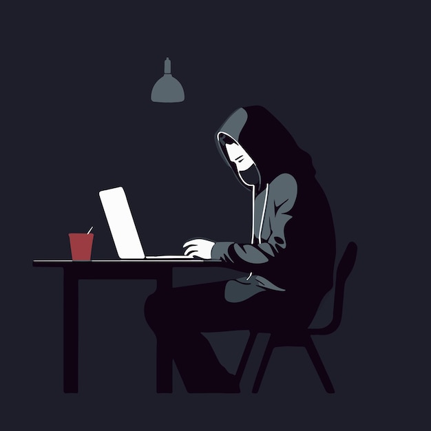 cyber security hacker sitting working on laptop