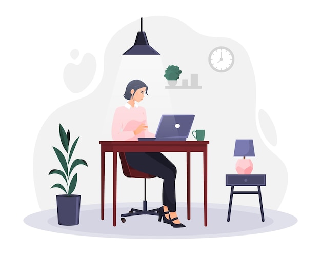 Freelance or remote work concept woman sitting at her workplace at home and working on laptop female