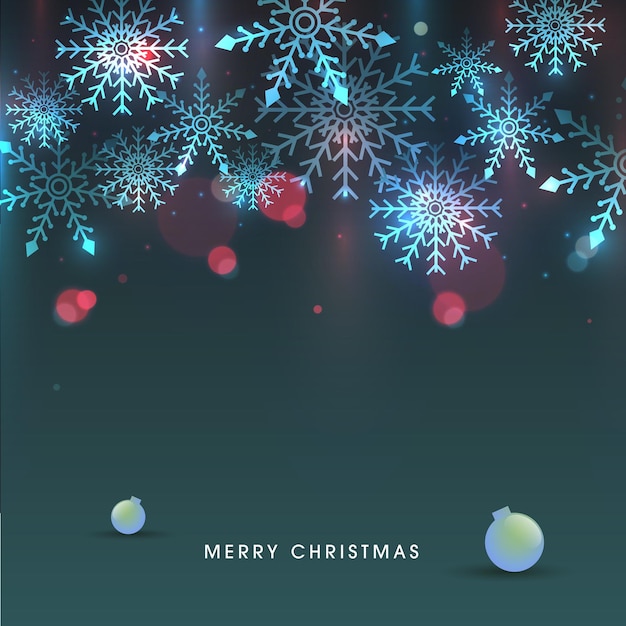 Green Background Decorated with Blue Snowflakes Bokeh Effect and Baubles for Merry Christmas