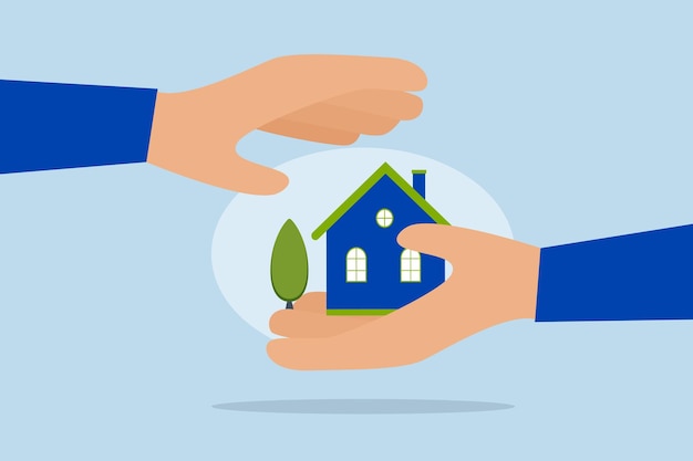 house insurance businessman holds the house in his hand while using his other hand to provide protection like insurance
