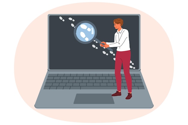 man is looking for traces on internet working osint specialist and holding loupe near laptop