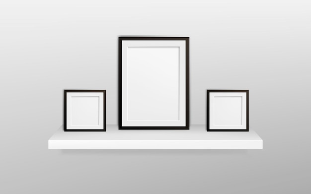 Realistic picture frame on black realistic shelf isolated on white background