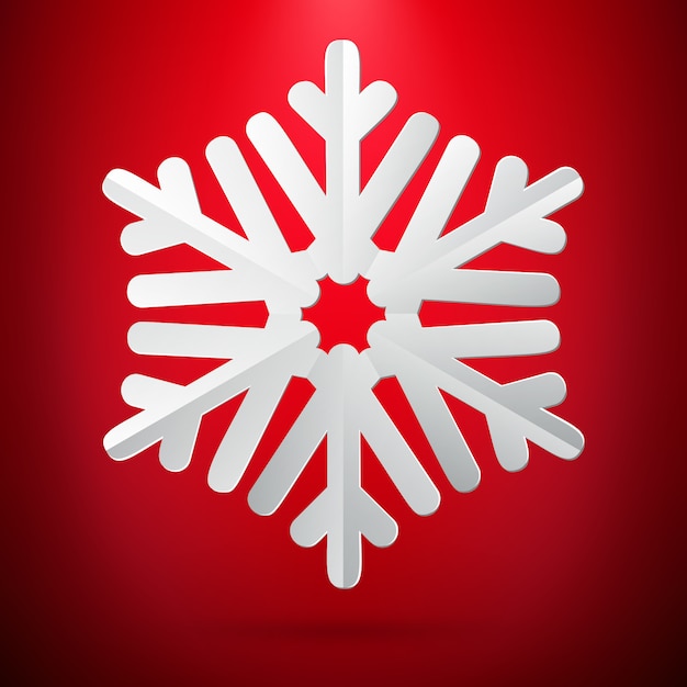 red background with paper snowflake.  