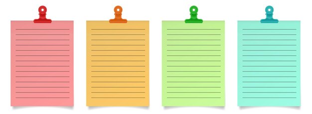 set of paper notes with bulldog paper clips red orange green and blue sheets of paper lined notebook