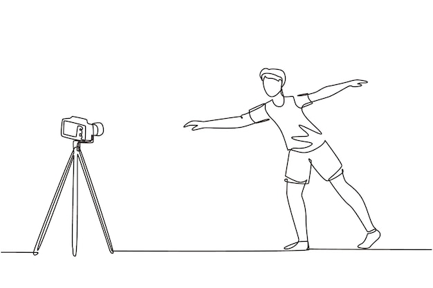 single one line drawing young man doing exercise on mat with camera shooting video online training