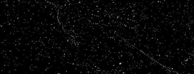 Starry black background cosmic style The background is black with white speckles Textured background with a black and white color scheme Minimal grainy speckled texture background vector