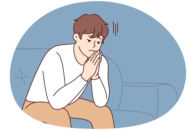 unhappy young man sit on sofa thinking worrying about life problem upset stressed male