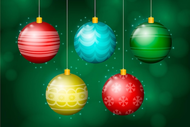 Vector gratuito adornos de bolas de navidad realistas