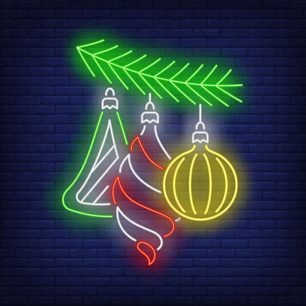 Adornos navideños en letrero de neón de rama de árbol de abeto
