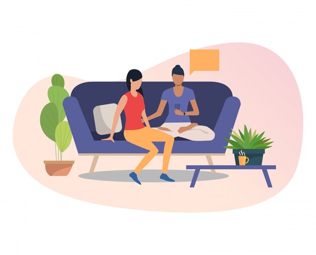 Amigas que usan el teléfono inteligente juntos
