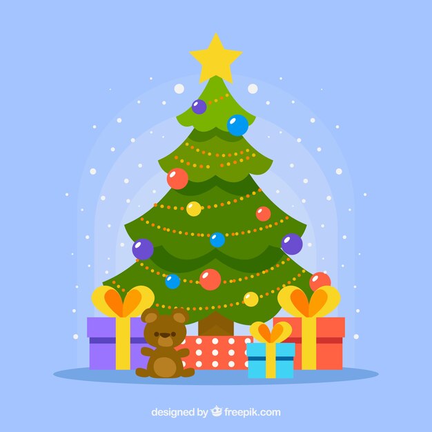 Árbol de navidad decorado con regalos debajo