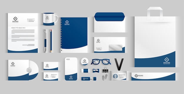 Vector gratuito artículos de papelería de negocios con estilo en color azul