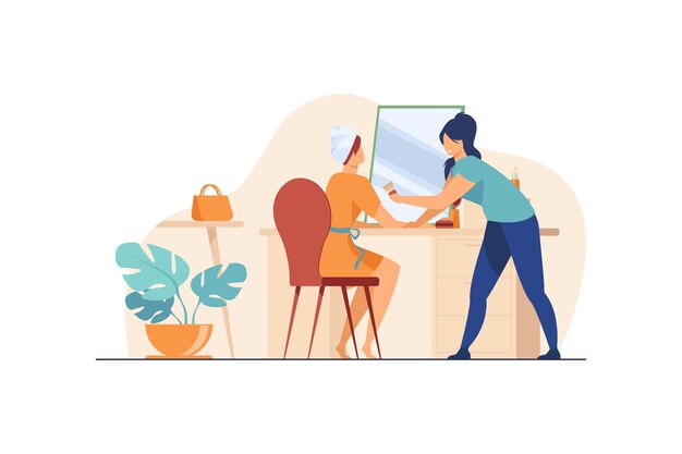 Artista de maquillaje trabajando en mujer