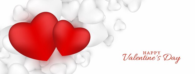 Banner de feliz día de san valentín dos corazones rojos