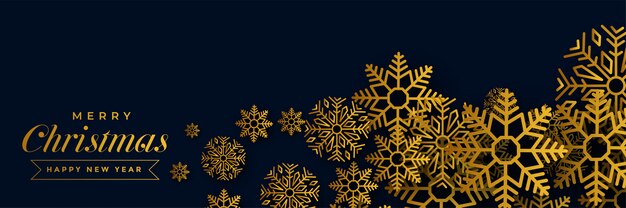 Banner navideño oscuro con copos de nieve dorados