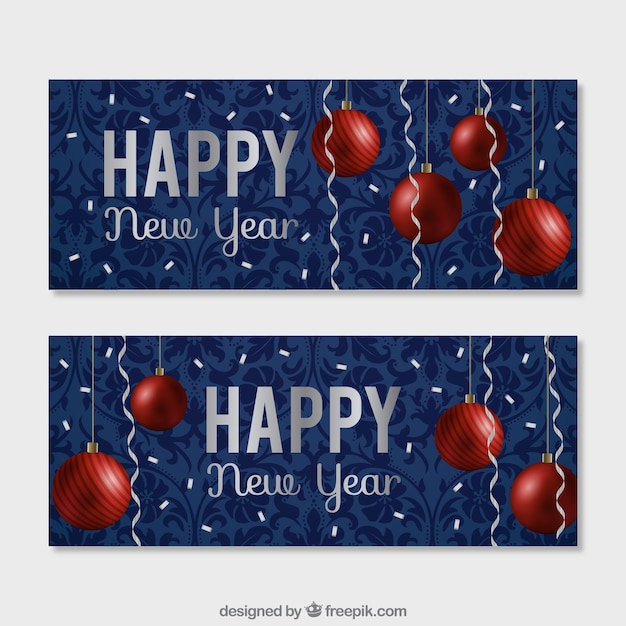 Banners de bolas de navidad en un fondo azul