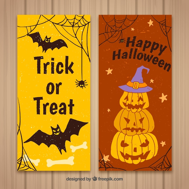 Banners de feliz halloween con calabazas y murciélagos