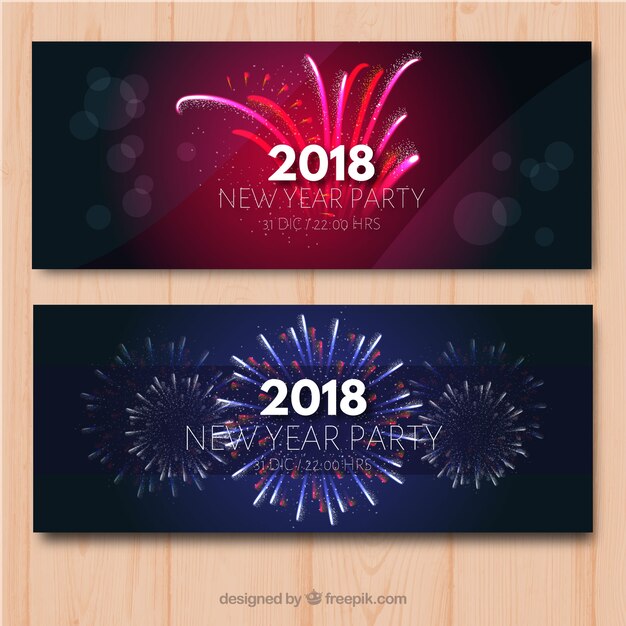 Banners festivos de año nuevo con fuegos artificiales