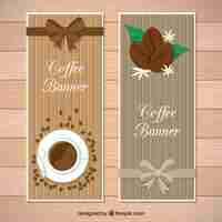 Vector gratuito banners de madera con lazos y objetos de café