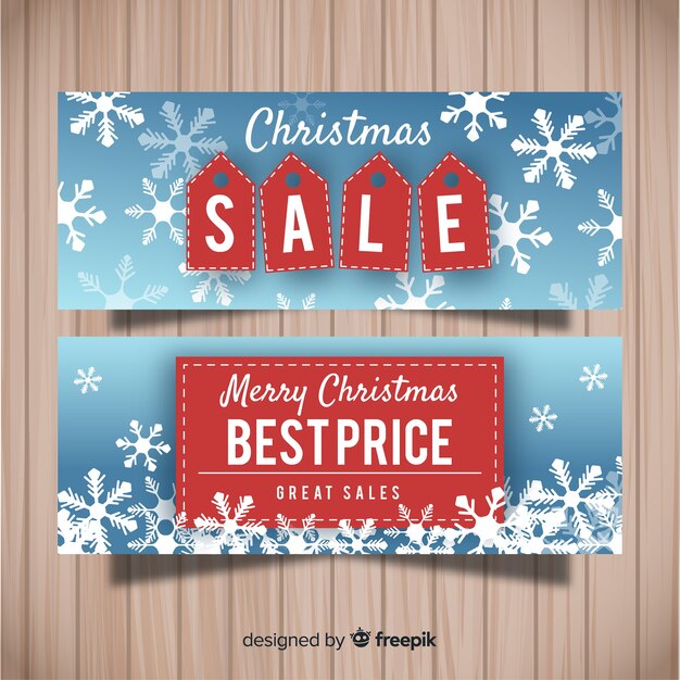 Banners de rebajas de navidad con copos de nieve