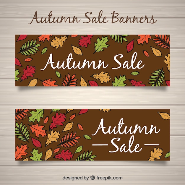 Vector gratuito banners con rebajas de otoño con hojas a mano