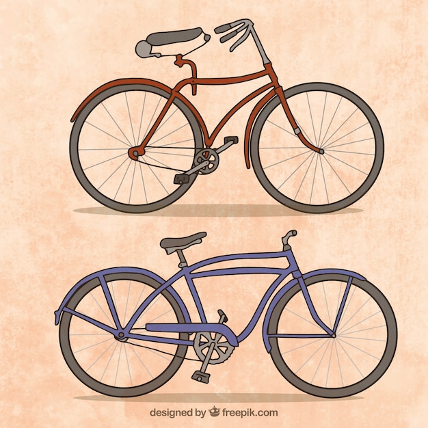 Vector gratuito bicicletas vintage dibujadas a mano