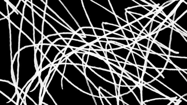 boceto garabateado y bolígrafo sobre fondo negro