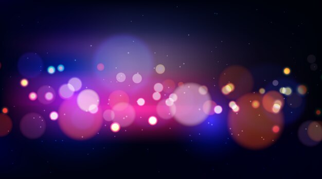 Bokeh coloridas luces sobre fondo oscuro