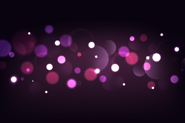 Bokeh efecto de luces sobre fondo oscuro