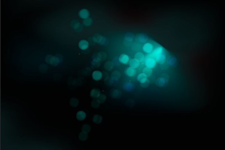 Vector gratuito bokeh efecto de luces sobre fondo oscuro