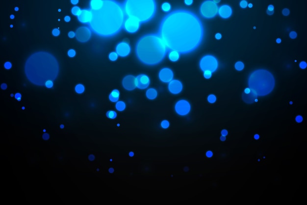 Vector gratuito bokeh efecto de luces sobre fondo oscuro