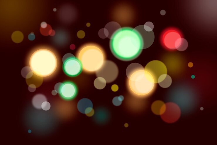 Vector gratuito bokeh efecto de luces sobre fondo oscuro