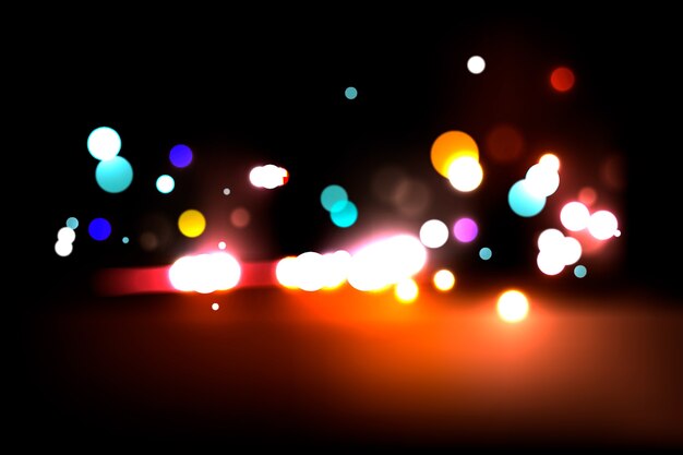 Bokeh efecto de luces sobre fondo oscuro