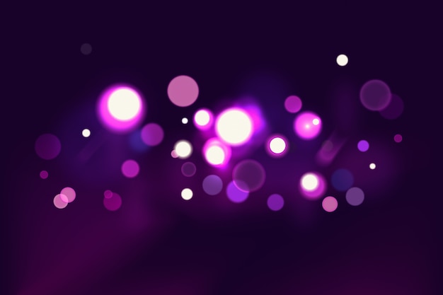 Bokeh efecto de luces sobre fondo oscuro