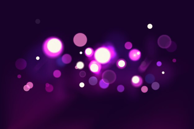Bokeh efecto de luces sobre fondo oscuro