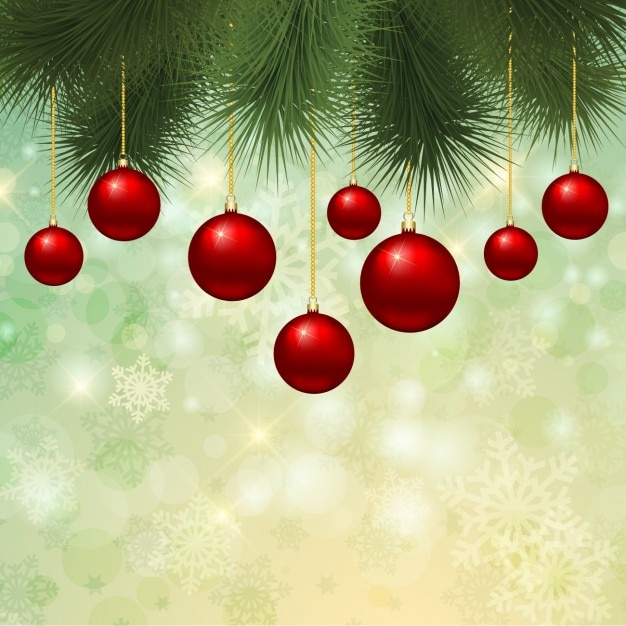 Bolas de navidad rojas sobre fondo verde