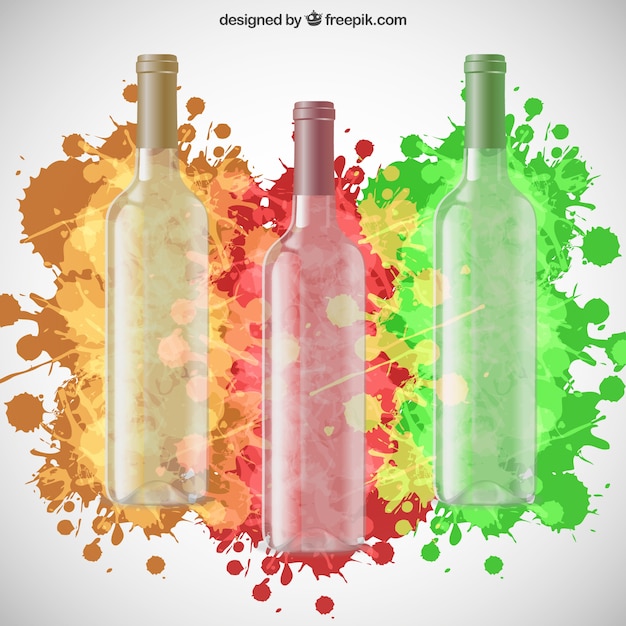 Botellas de vino y coloridas salpicaduras de pintura