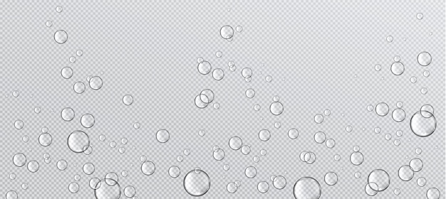Burbujas de agua gaseosa flotan sobre un fondo transparente