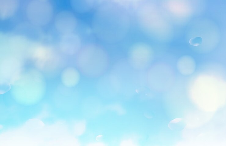 Burbujas de bokeh y destello del sol sobre un fondo azul