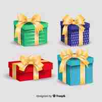 Vector gratuito cajas de regalo coloridas con cinta